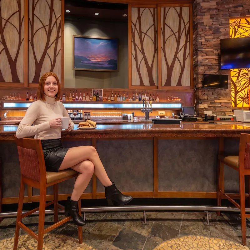 Woman at the Deli & Bar counter, Living Sky